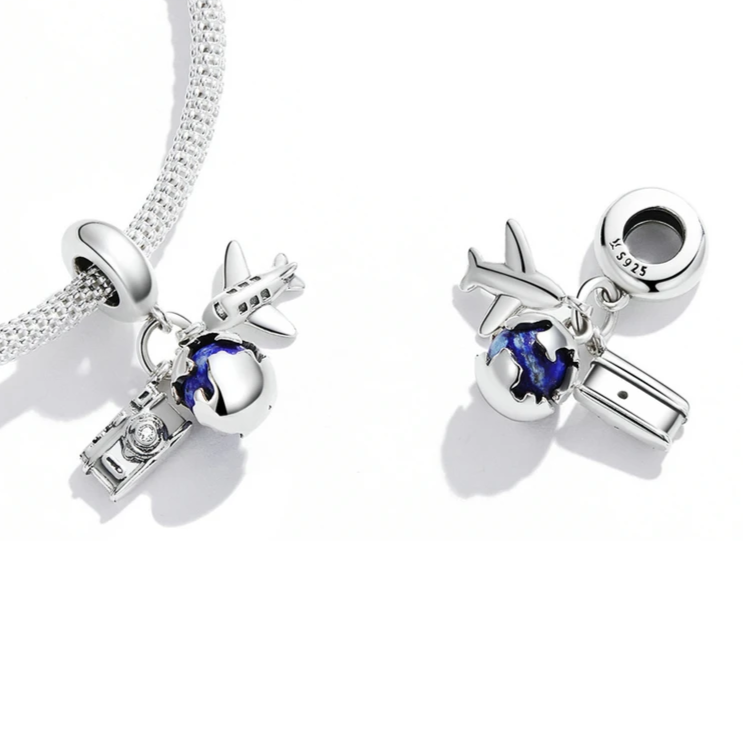 Sterling silver travel charm with cubic zirconia and enamelled globe | Asttery