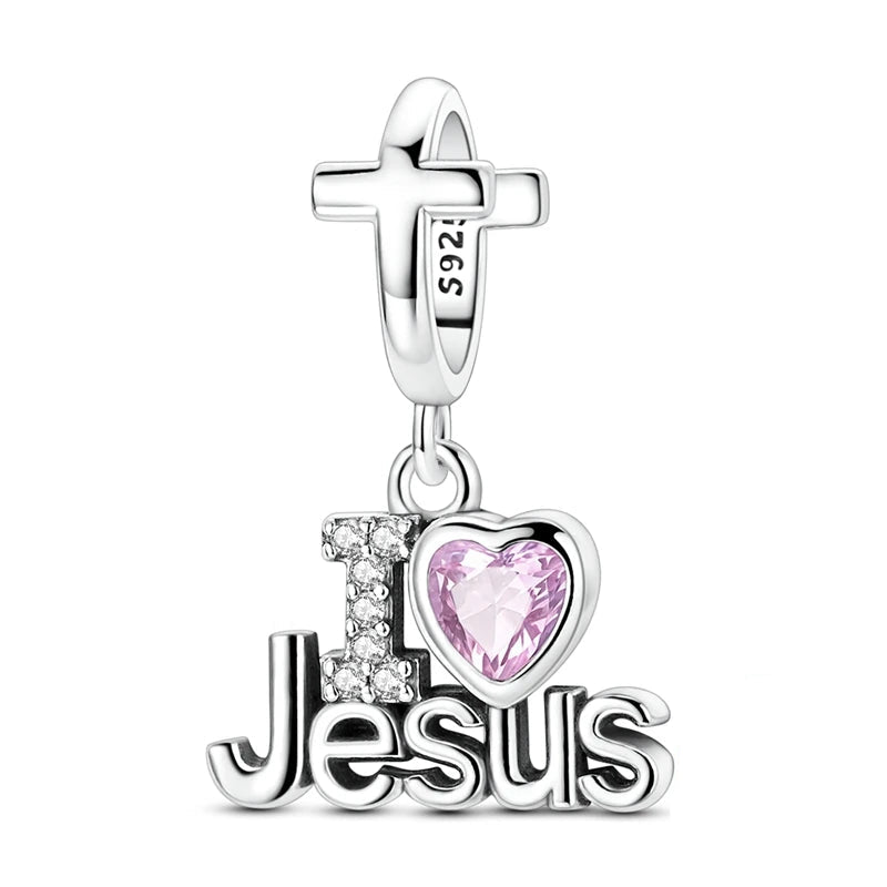 925 silver Amoria Faith dangle charm with cross and ‘I Love Jesus’ design featuring cubic zirconia and pink heart stone | Asttery