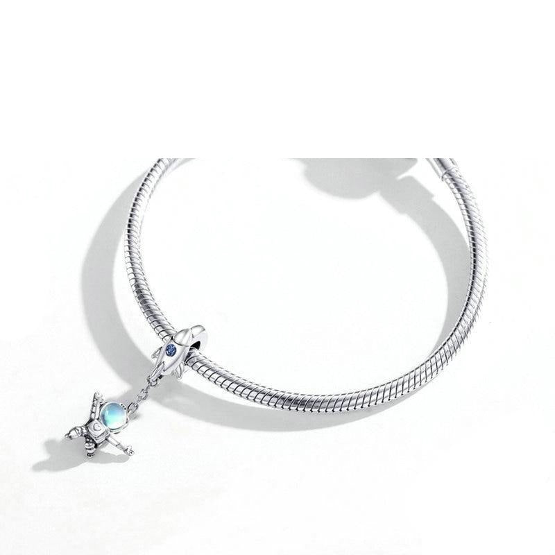 Orryon charm on bracelet, symbol of cosmic dreams, courage and gentle exploration | Asttery
