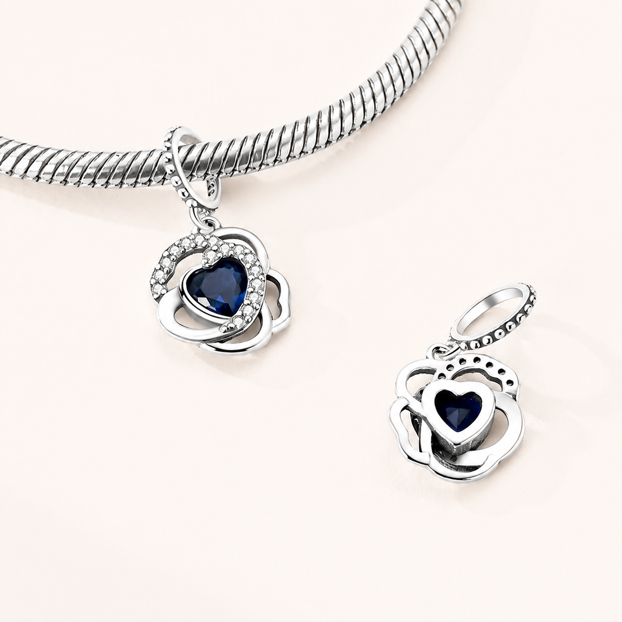 925 sterling silver Azur heart charm styled on a silver bracelet | Asttery