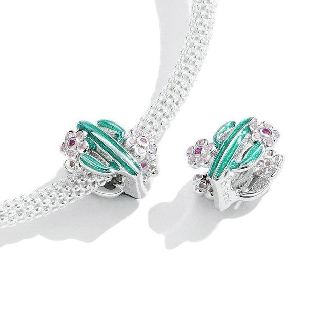 Sterling silver charm in the form of a cactus with pink blossoms and green enamel – Sierra | Asttery