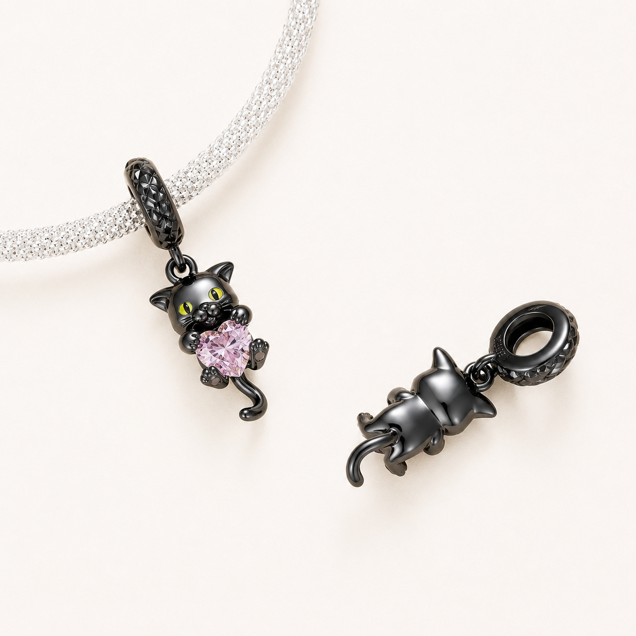 Front and back view of the 925 sterling silver black cat dangle charm | Suki by Asttery