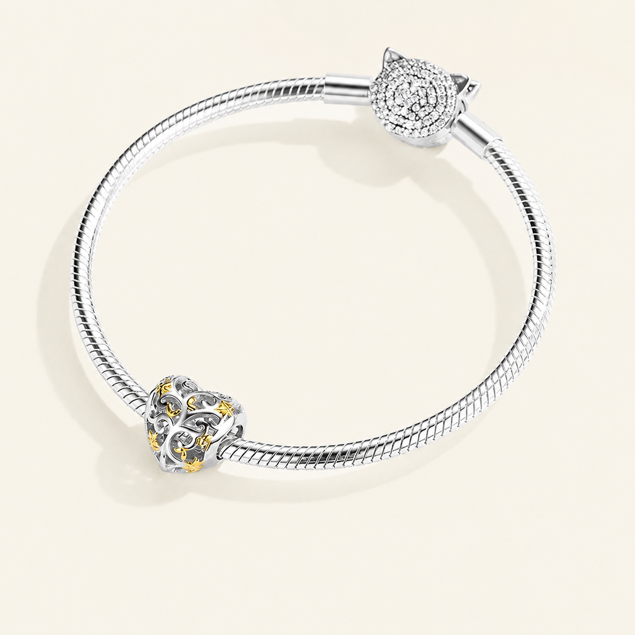 Heart-shaped sterling silver charm bead with openwork leaves and gold accents | Asttery