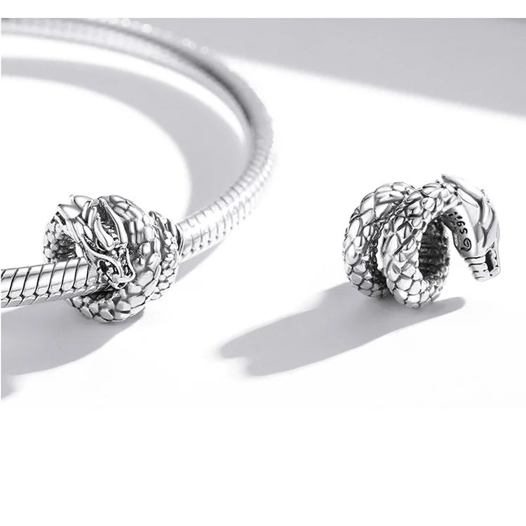 Dravik charm on bracelet, a symbol of inner strength and elegant self-mastery | Asttery