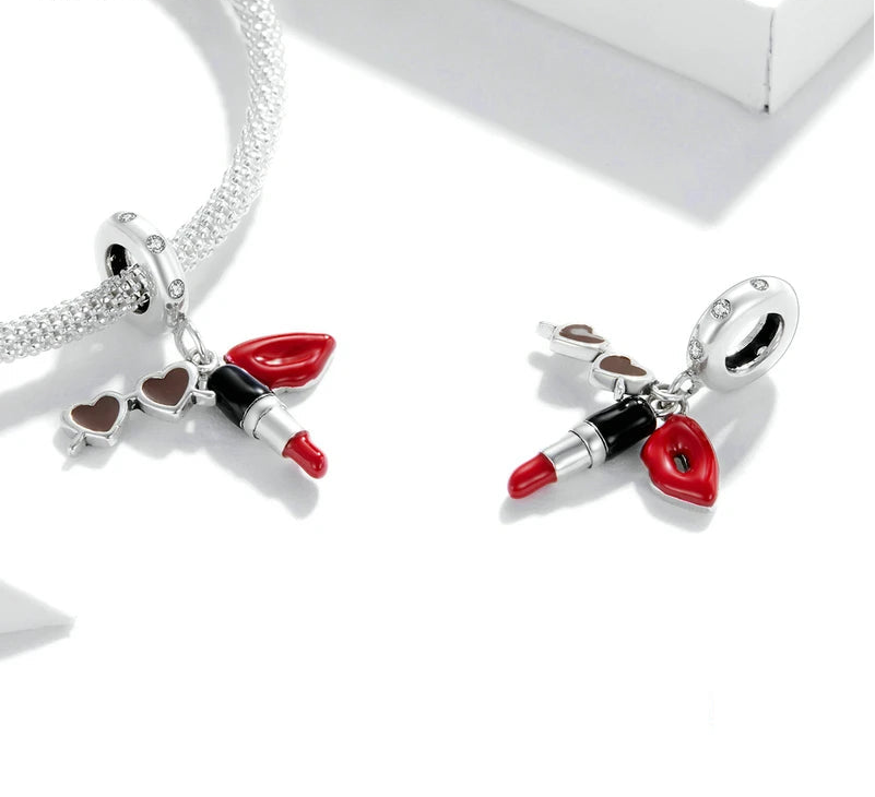 Front and back view of the 925 sterling silver lipstick dangle charm showing zirconia-studded silver ring and colorful enamel details | Asttery