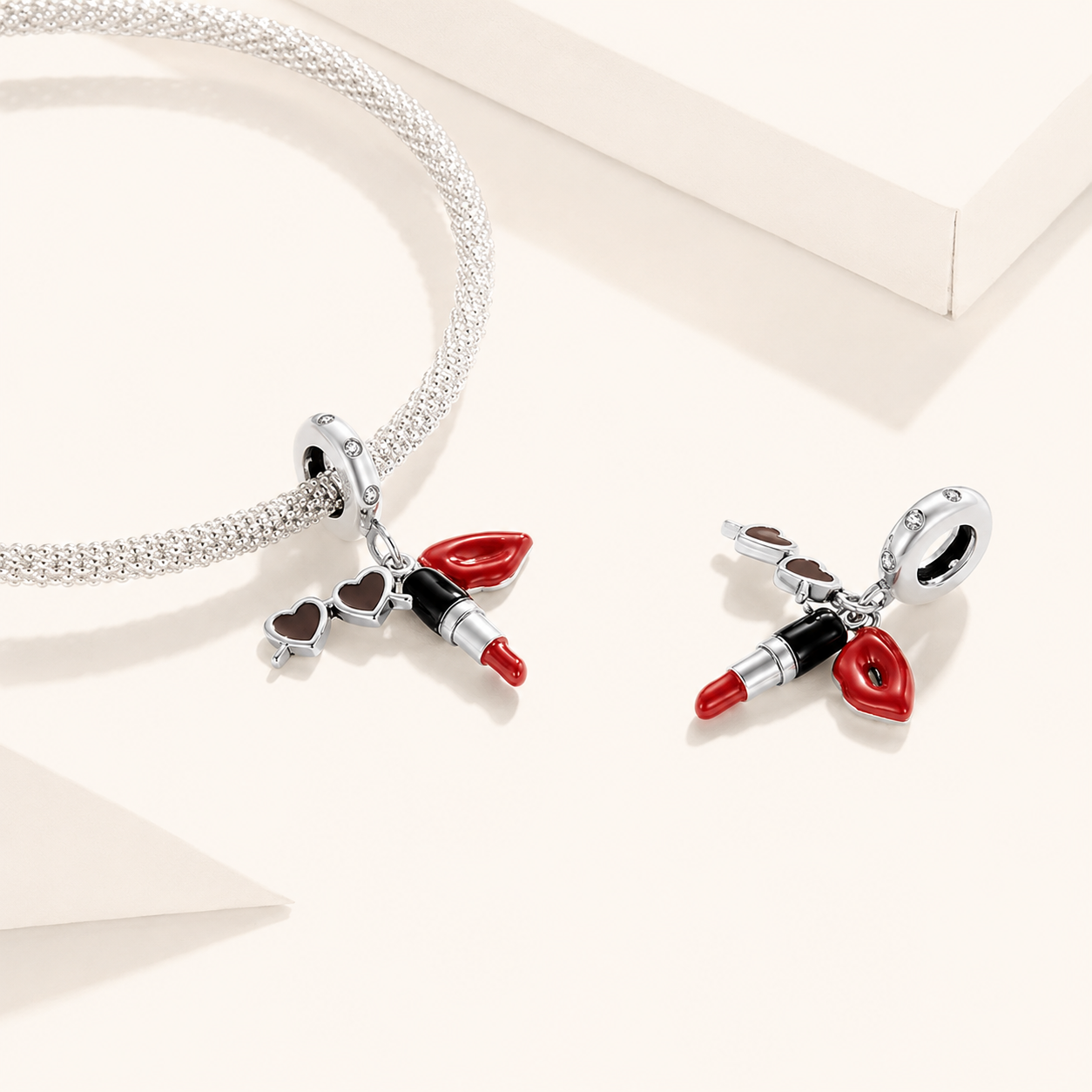 Front and back view of the 925 sterling silver lipstick dangle charm showing zirconia-studded silver ring and colorful enamel details | Asttery
