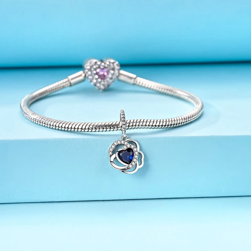 925 sterling silver heart dangle charm featuring a deep blue heart | Asttery