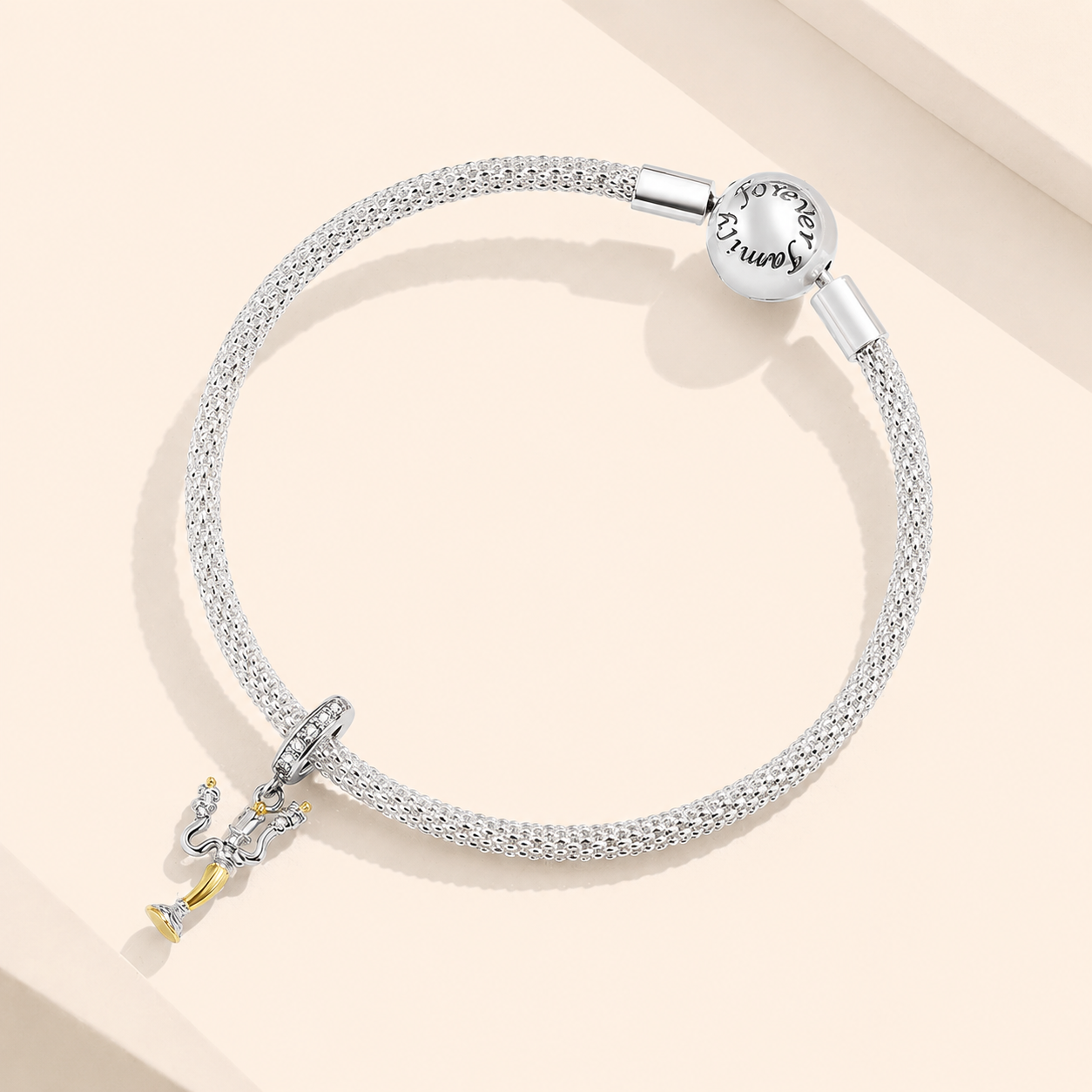 Candelabra dangle charm shown on a silver bracelet | Asttery