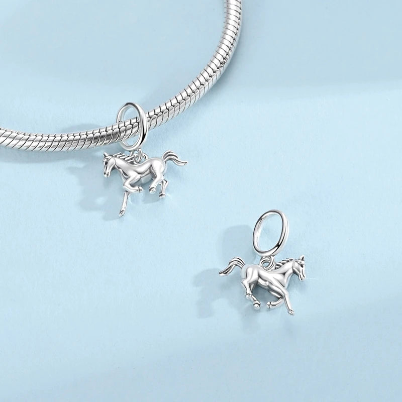 Side view of the Kairun horse dangle charm in polished 925 sterling silver | Asttery