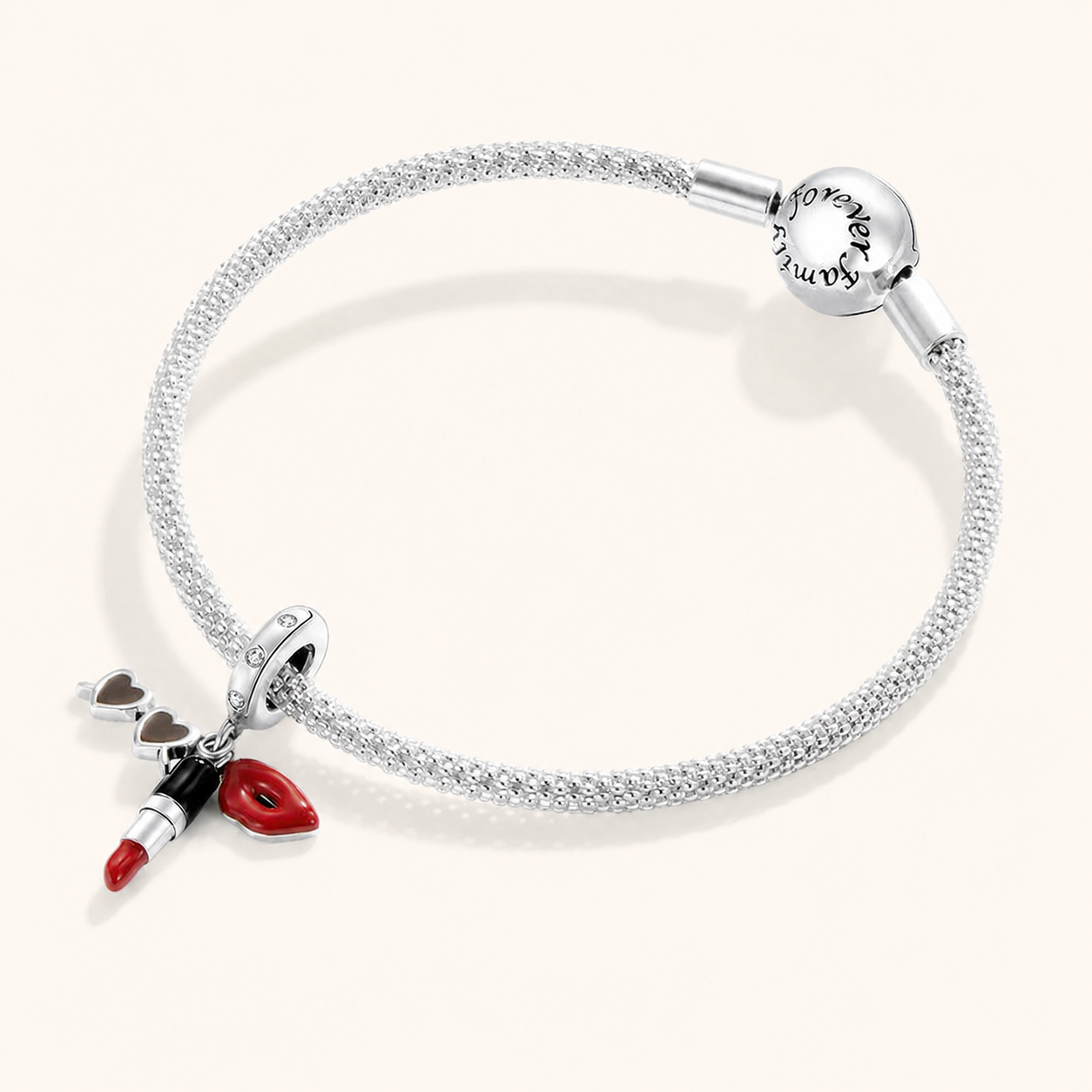 Lipstick dangle charm shown on a silver bracelet | Erové by Asttery