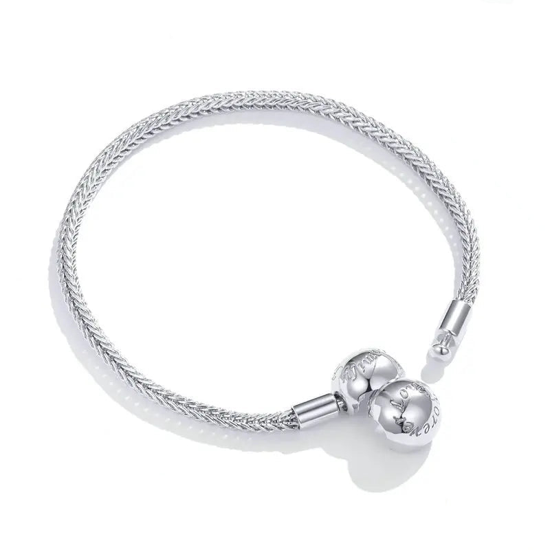 Close-up view of the ‘Love Forever’ clasp on the 925 sterling silver snake chain bracelet | Eltheris by Asttery