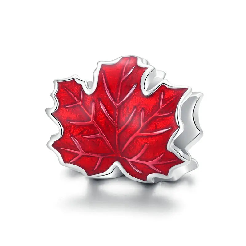 Maphyra charm in 925 sterling silver with red enamel maple leaf | Asttery