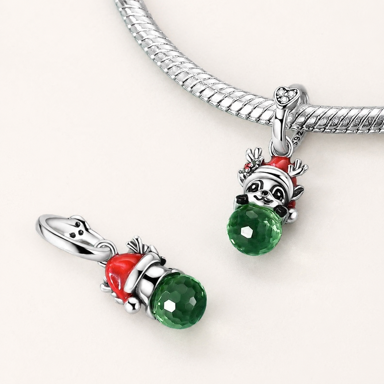 Front and back view of the 925 sterling silver reindeer dangle charm | Merrin by Asttery