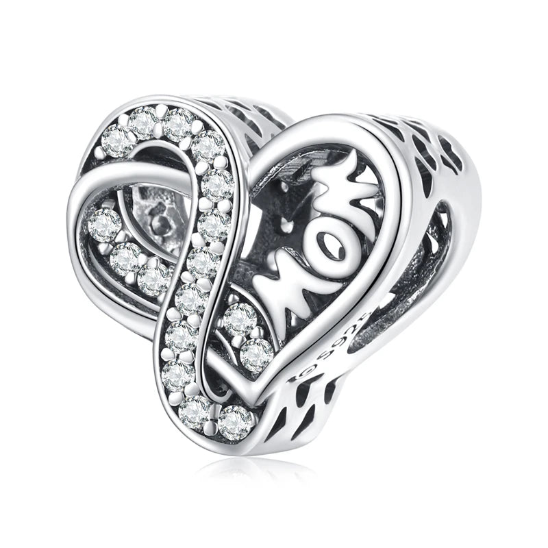 Eternia heart charm with infinity symbol and zirconia details in sterling silver | Asttery