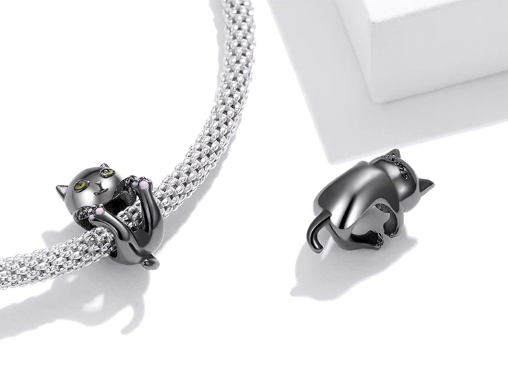 Noctelle charm on bracelet, symbol of intuition, gentleness, and feline grace, 925 sterling silver, Asttery