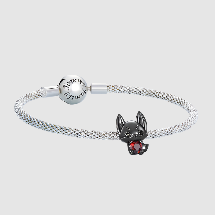 Nyxari black fox charm on bracelet, symbol of quiet affection and mystery | Asttery