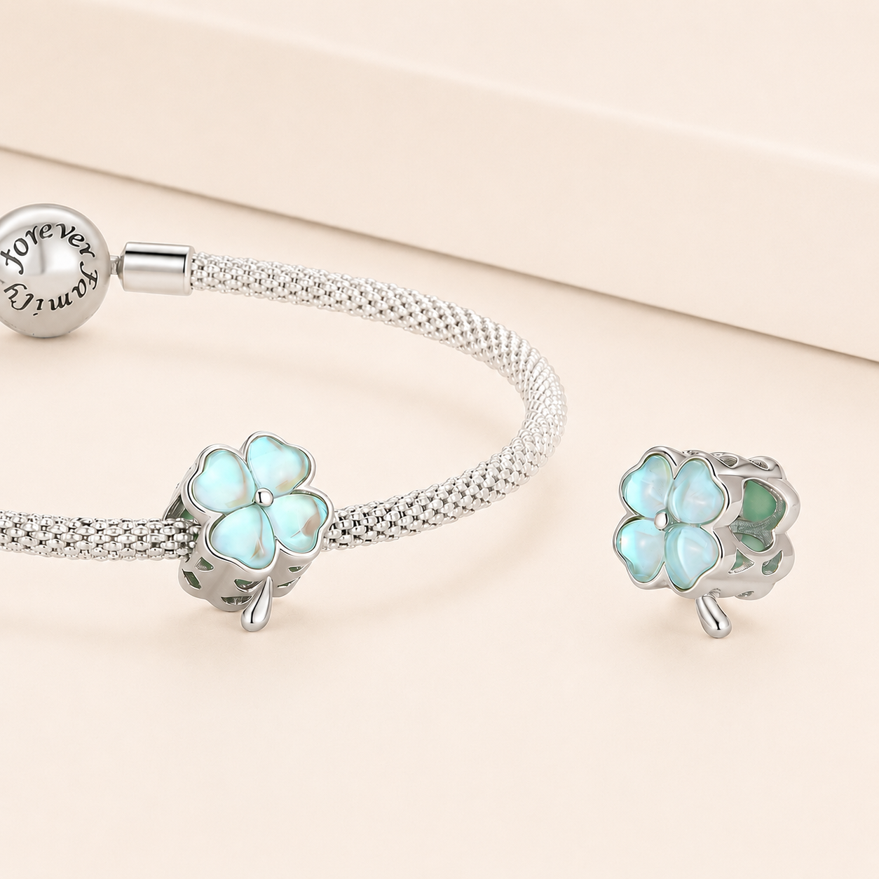 Front and back view of the 925 sterling silver  pastel green glass clover charm bead |  Livory by Asttery