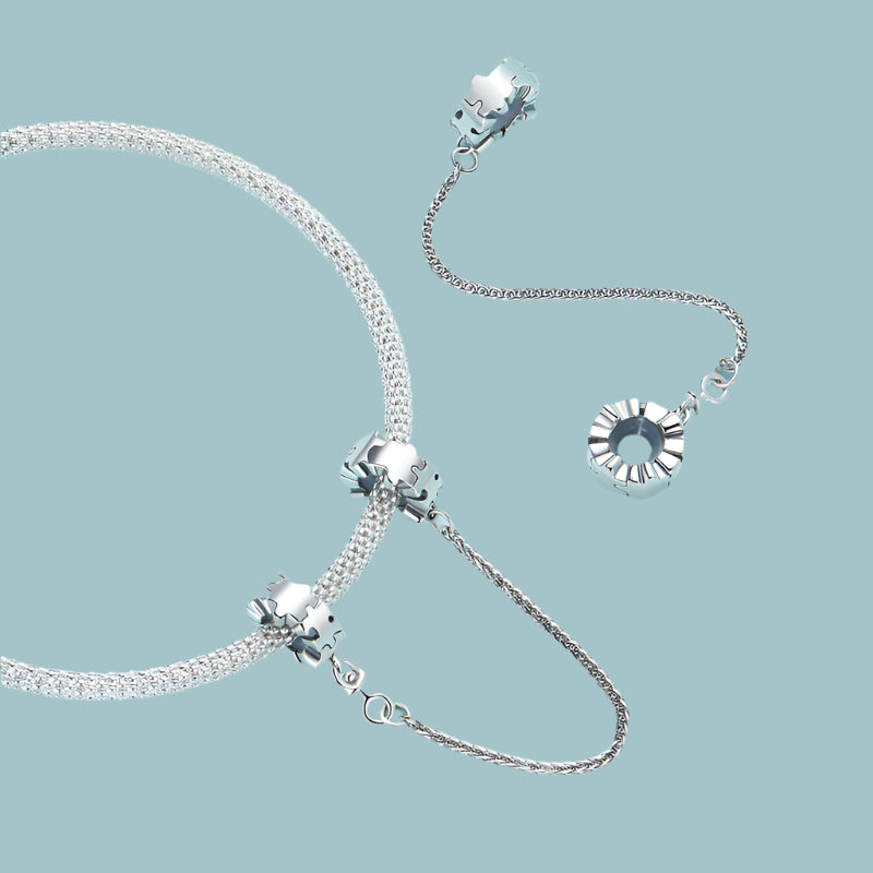 Sterling silver puzzle chain charm with polished finish | Asttery