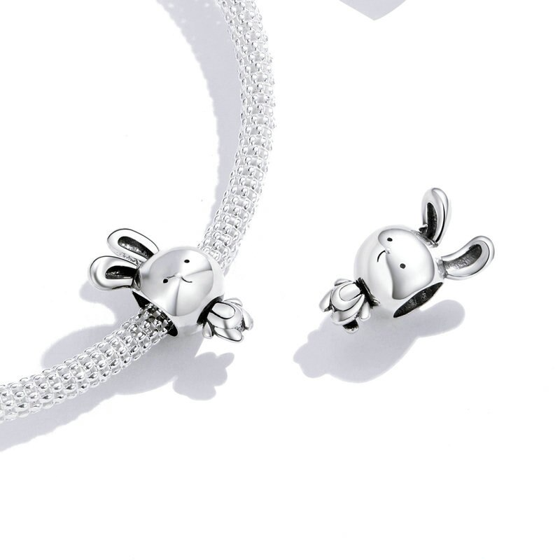 Anevin charm on bracelet, symbol of serenity, tenderness, and quiet joy, Asttery