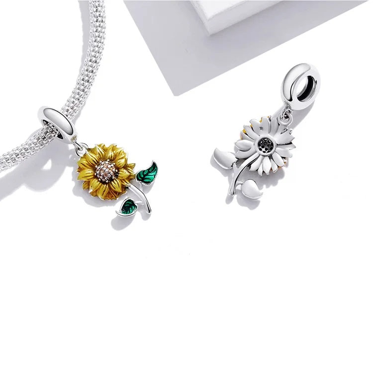 925 silver jewellery shaped like a sunflower with golden petals and green leaves | Asttery