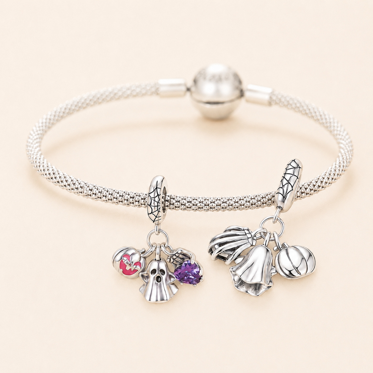 Sterling silver ghost charm with skeleton hand, heart zirconia and enamel pumpkin | Asttery