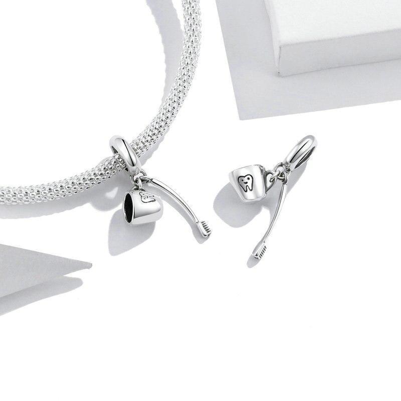 Brivvi dangle charm set in 925 silver with care-themed pendants | Asttery