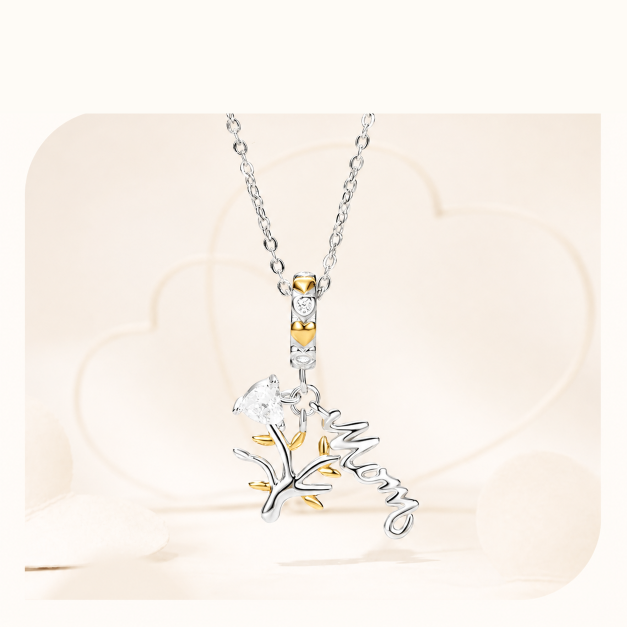 Veris charm showing Mom script, zirconia stones and gold plated details | Asttery