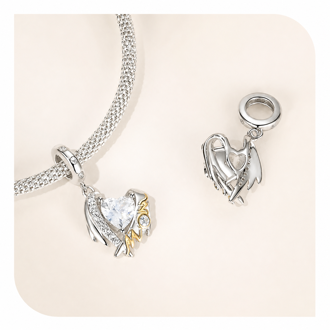 925 silver winged heart mom charm symbolising protection and unconditional love on bracelet | Asttery