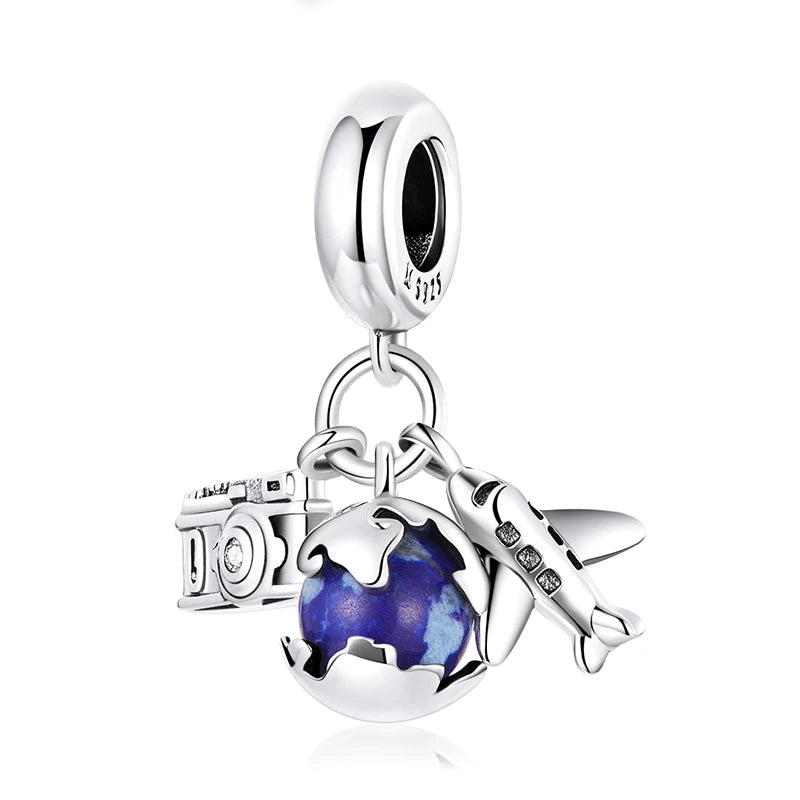Aeris charm in 925 sterling silver with blue globe, plane and camera | Asttery