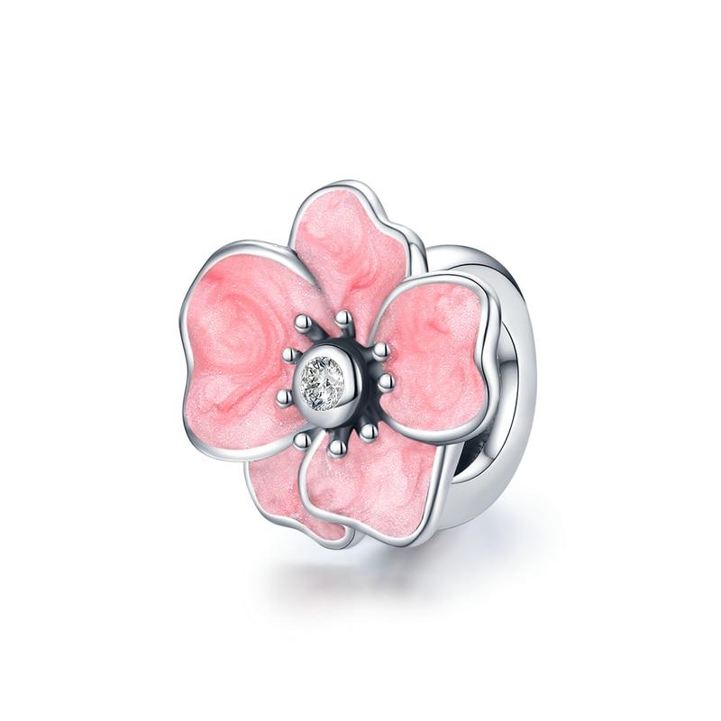 Yuna flower charm in 925 sterling silver with pink enamel and clear zirconia | Asttery