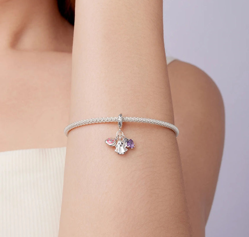 Drop-style charm with ghost, skeleton hand and pumpkin details | Asttery