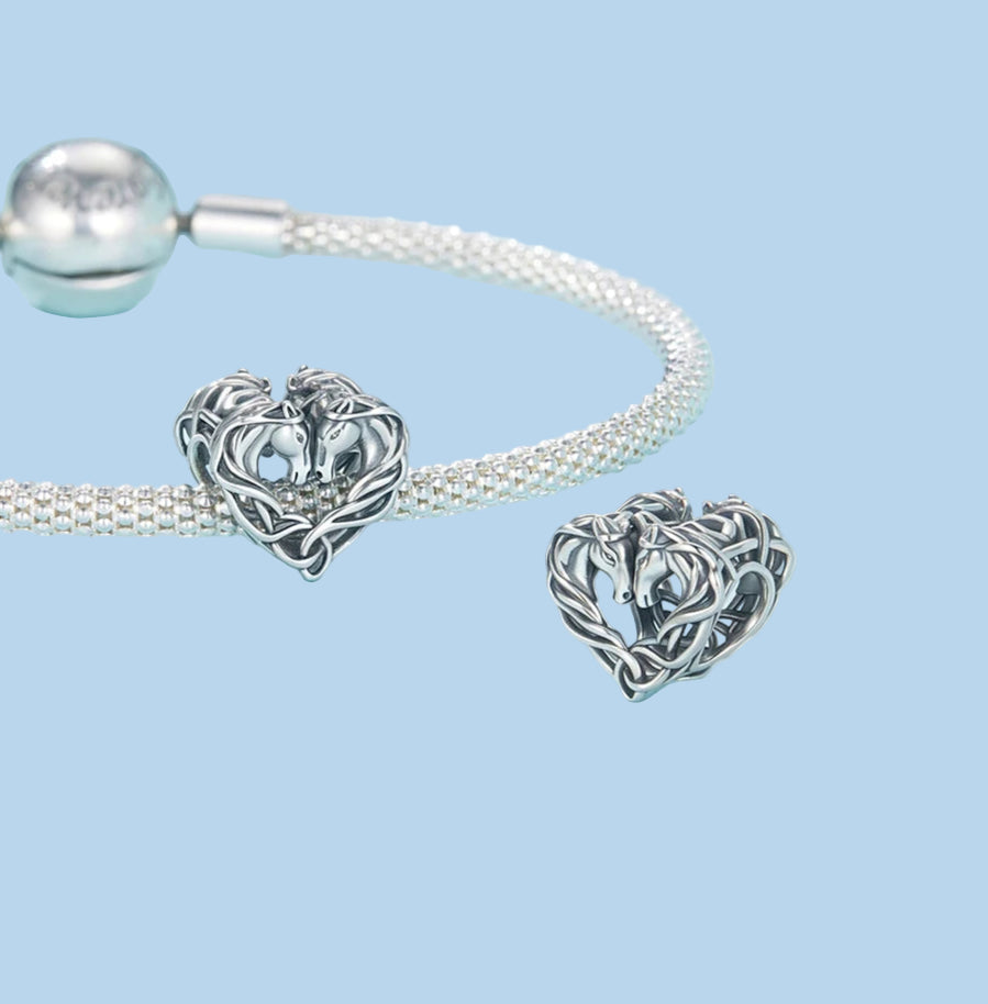 Symmetrical heart design with horses in silver openwork | Asttery