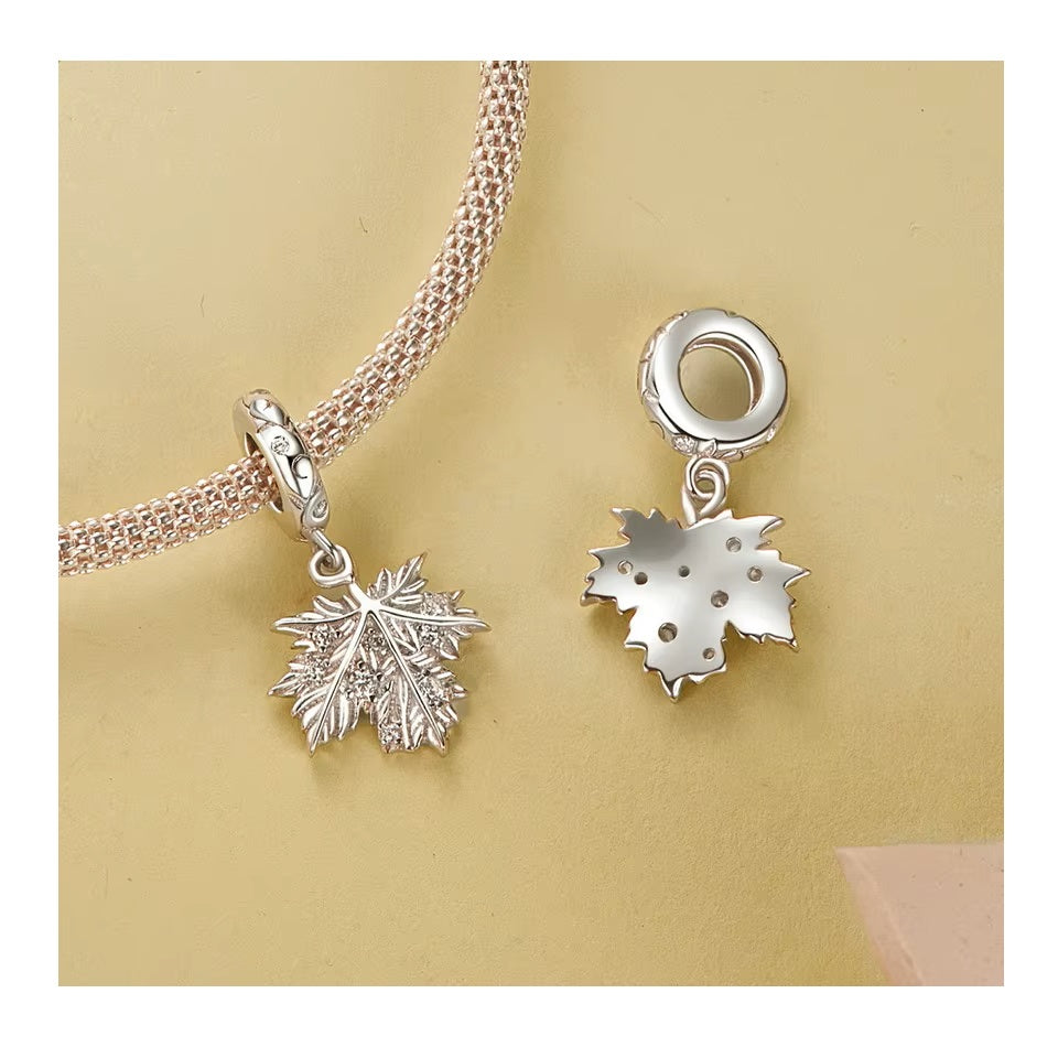Maphelle maple leaf charm in polished 925 sterling silver with sparkling zirconia | Asttery