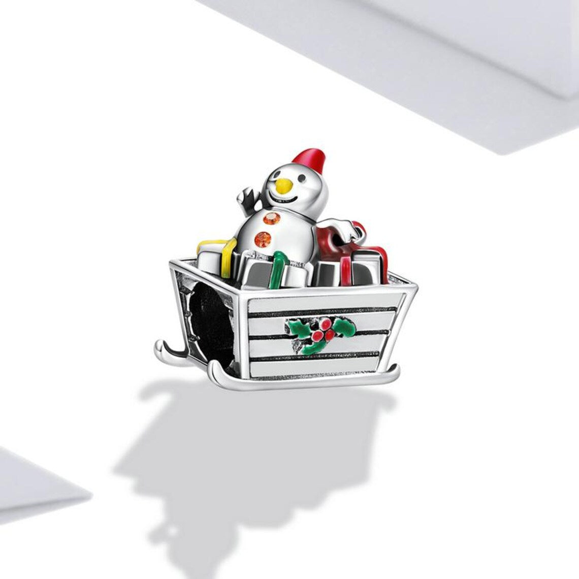 Flokim charm showing the enamel gifts and snowman details | Asttery