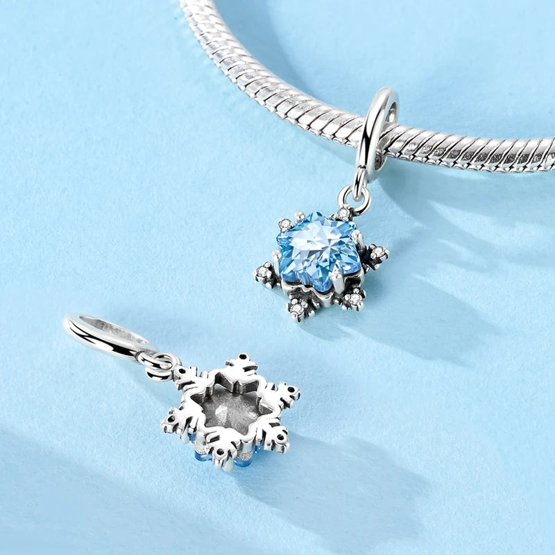 Front and back view of the 925 sterling silver winter star dangle charm | Iskar by Asttery
